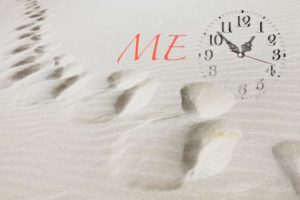 Me Time is key in getting into healthier habits, as illustrated by this clock in the sand with the words ME in front.