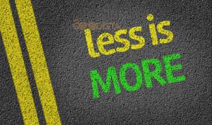 Healthier Lifestyle is doing Less to get More illustrated by Less is More written on a road.