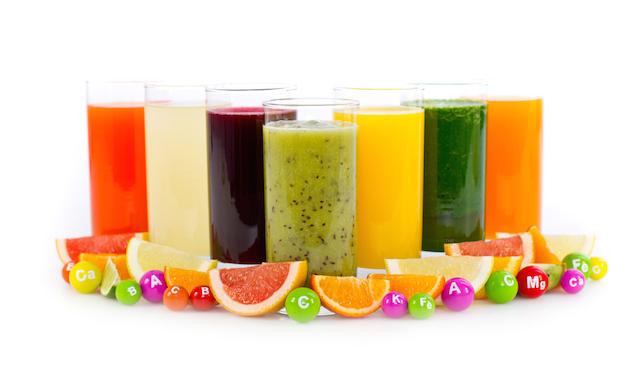 Juicing adds vitamins and minerals to your body, as illustrated by these raw fruit and veg juices.