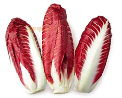 Radicchio or Italian Chicory is excellent in warm salad. In picture three Radicchio heads. Find recipe on thegoodista.com