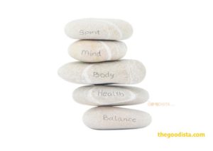 Mindfulness benefits lifestyle changes and completes them, illustrated by stones balancing on top of each other. Read more on thegoodista.com