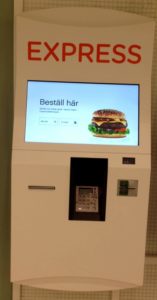 Food conscientious is about knowing what your body needs, and not choosing processed junk illustrated by hamburger express machine.