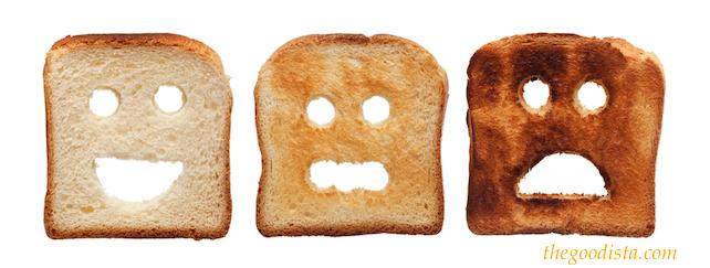 Clean food challenge means saying bye bye to white toast illustrated by three unhappy toast bread slices.