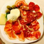 Wellness fitness and spa vacation has to include good food. Here a plate of home cured salamis, ham and cheese from Litrico's Restaurant and Pizzeria across from Santavenere hotel.