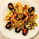 Wellness fitness and spa vacation must include excellent food. In picture Seafood pasta from Litrico's Restaurant and Pizzeria.