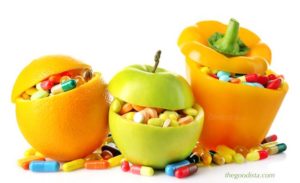 Supplements cannot replace food and is not always a wise choice, read why on thegoodista.com, illustrated by frusg fruit and vegetables filled with pills