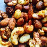 Roasted nuts with a spicy, savoury coating in this picture