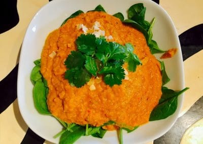 carrot soup with coconut, coriander and ginger. Here seen as its thicker version.